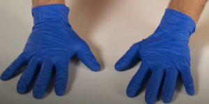 What do nitrile gloves protect against?